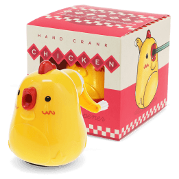 Hand-crank chicken pencil sharpener with yellow plastic body and retail packaging.