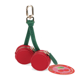 Cherry-shaped coin purse with zip compartments, green strap and gold-tone keychain with tag.