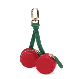 Cherry-shaped coin purse with zip compartments, green strap and gold-tone keychain.