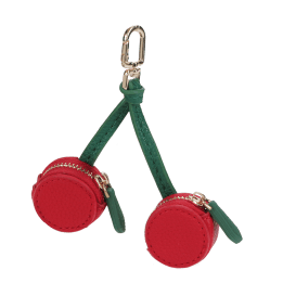 Cherry-shaped coin purse with zip compartments, green strap and gold-tone keychain.