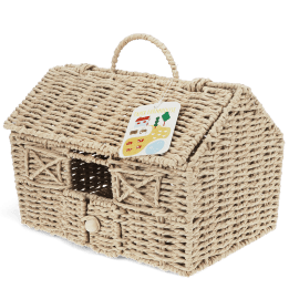 Woven farmhouse-shaped basket with pitched roof, handle, window and tag.