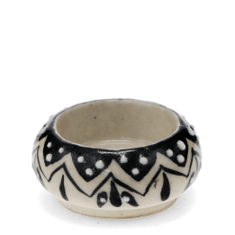 Round ceramic tealight holder with black zigzag pattern