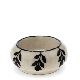 Round ceramic tealight holder with black leaf pattern 