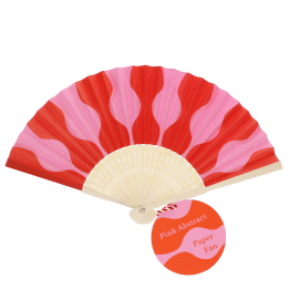 Pink and red abstract recycled paper hand fan with cream folding handle.