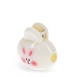 Bunny-themed travel toothbrush case with pink rabbit face 