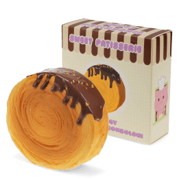 Chocolate-topped cromboloni squishy toy shown beside matching display box.