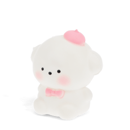 White bear squishy toy with pink bow tie and hat, featuring a soft rounded design.