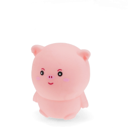 Pink pig-shaped squishy toy with smiling face and soft rounded design