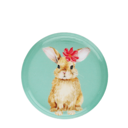 Round metal trinket tray featuring an illustrated rabbit with a red flower.