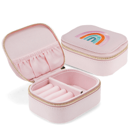 Open pink jewellery box with embroidered rainbow design, ring rolls and storage compartments.