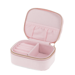 Open light pink jewellery box with ring rolls, storage compartments and interior pockets.