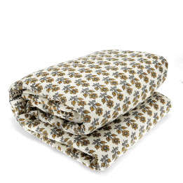 Hand block-printed throw with yellow floral pattern,