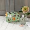 Light green oilcloth makeup bag with illustrations of cats
