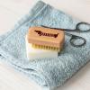 wooden nail brush featuring a sausage dog illustration