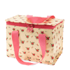 Insulated lunch bag decorated with a floral pattern