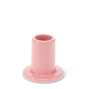 Pink ceramic candle holder with a cylindrical shape and wide flat base