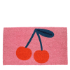 doormat featuring red cherry print in a pink background