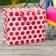 Recycled plastic jumbo storage bag red circles cream background