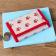 Wallet in pink featuring colourful illustrations of red cherry print 