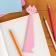Pink ruler shaped like a sitting cat.
