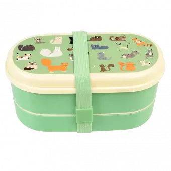 Light green kids bento box with cream lid and middle tray plus light green elastic strap featuring illustrations of cats
