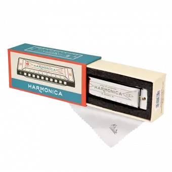 Metal and plastic harmonica in box with cleaning cloth