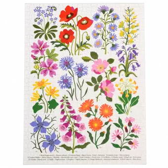 Completed 1000 piece jigsaw puzzle with images of various wild flowers