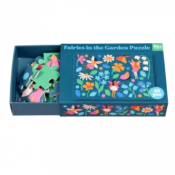 Fairies in the Garden puzzle pieces inside box