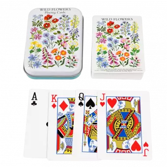 Standard deck of playing cards with print of wild flowers on white background on backs plus metal tin
