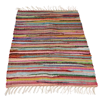 Multicoloured handloomed cotton rug laid flat