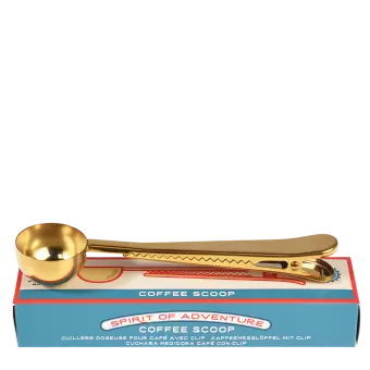 Spirit of Adventure coffee scoop with bag clip on top of box