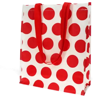 Recycled plastic shopping bag in cream with red spots