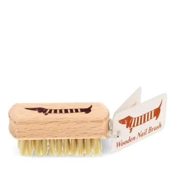 Wooden nail brush with sausage dog printed on the handle and a tag