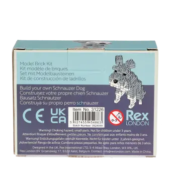 Back of build your own Schnauzer dog packaging, showing multilingual product descriptions and safety warnings