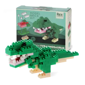 completed tyrannosaurus model alongside the packaging