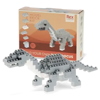 completed diplodocus model alongside the packaging