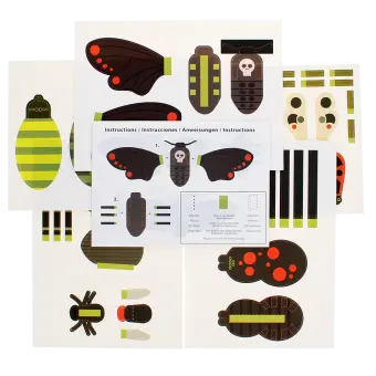 paper craft kit with cut-out pieces and instruction sheet