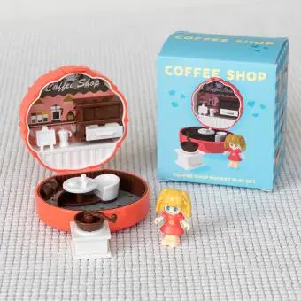 miniature coffee shop playset with packaging box in the background