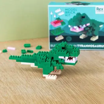 completed tyrannosaurus model kit with packaging