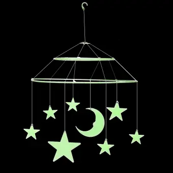 Glow-in-the-dark hanging mobile featuring stars moon