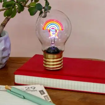rainbow light bulb showing with the light on