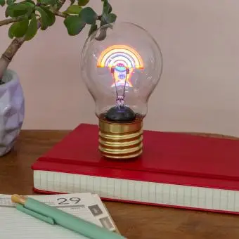 rainbow light bulb showing with the light on