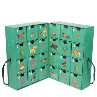 Green advent calendar with 24 numbered drawers and dogs