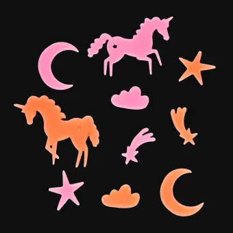 Assorted glow-in-the-dark unicorn featuring stars, moons, and clouds on a black background