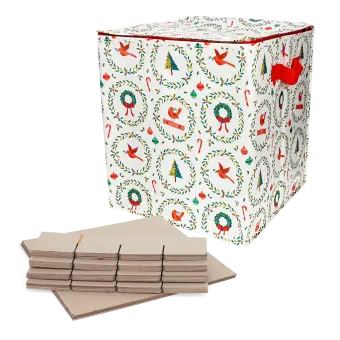 Cube-shaped storage bag with festive Christmas illustrations, featuring a red side handle and flat cardboard inserts in front