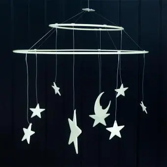 Glow-in-the-dark hanging mobile featuring stars moon