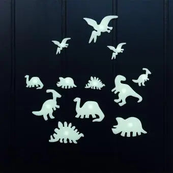 Various glowing dinosaur species on a black background