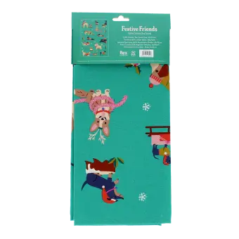 cotton tea towel featuring festive dog print in a packaging