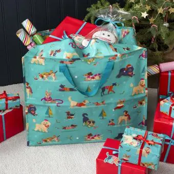Large rectangular storage bag printed with dogs in Christmas-themed outfits, with handles