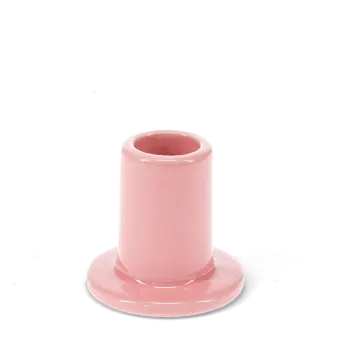 Pink ceramic candle holder with a cylindrical shape and wide flat base